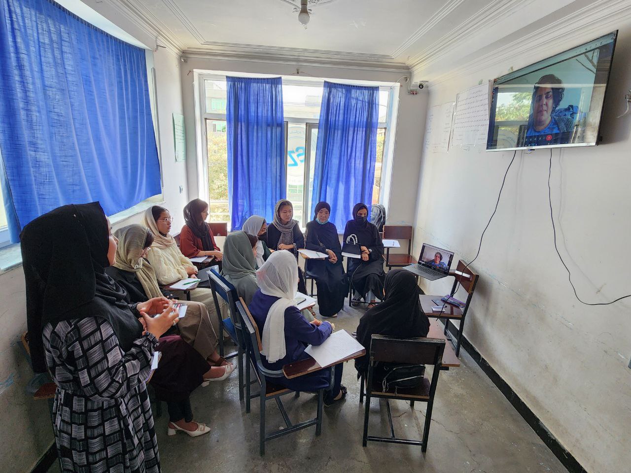 Girls studying together online